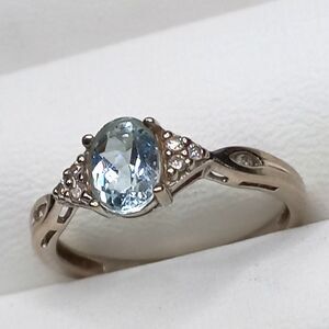 10K White Gold Aquamarine Ring with 6 Diamonds, 3 on each side  Size 7